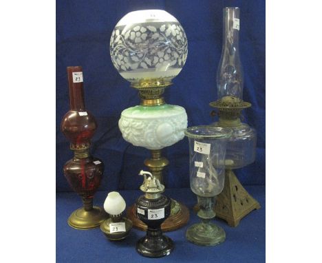 Group of six assorted oil lamps, various, to include: brass double burner with repousse opaque glass reservoir, another doubl