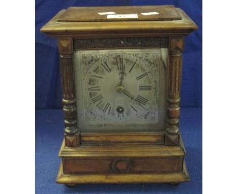 Early 20th Century walnut cased Continental single train architectural mantel clock with silvered face.(B.P. 24% incl. VAT)