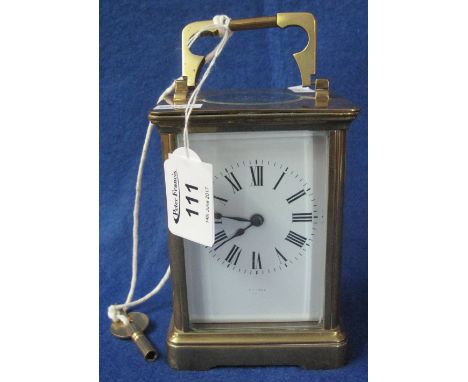 Early 20th Century French brass carriage clock by Couaillet, having full depth white enamel face with Roman numerals and two 