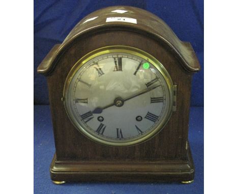 Early 20th Century mahogany dome topped, two train mantel clock with silvered Roman face.(B.P. 24% incl. VAT)