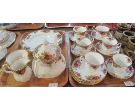 Two trays of Royal Albert bone china 'Old Country Roses' teaware items comprising: teacups and saucers; teapot; milk jug; suc