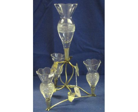 Silver plated epergne with four cut glass, thistle shaped flutes.(B.P. 24% incl. VAT)   CONDITION REPORT:  All glass flutes h