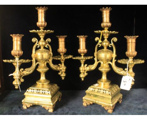 Pair of two branch, brass, scroll decorated candelabra. (2)(B.P. 24% incl. VAT)