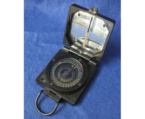 British military compass, 'Magnetic Marching Mark I' with War Department arrowhead and registration number B320696.  Maker's 
