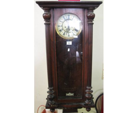 Early 20th Century two train Vienna type wall clock with enamel face and Roman numerals.(B.P. 24% incl. VAT)