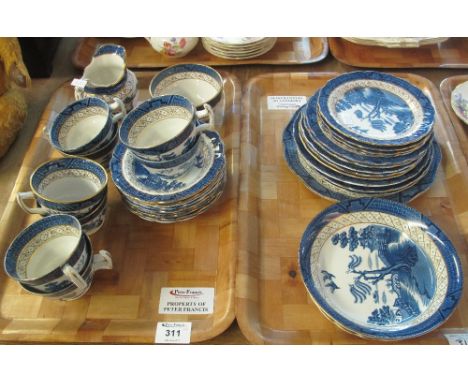 Two trays of Booth's 'Real Old Willow' teaware items comprising: teacups and saucers; milk jug; sugar bowl; various plates et