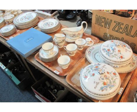 Four trays of Wedgwood bone china 'Kutani Crane' tea and dinnerware items comprising: teacups and saucers; oval lidded tureen