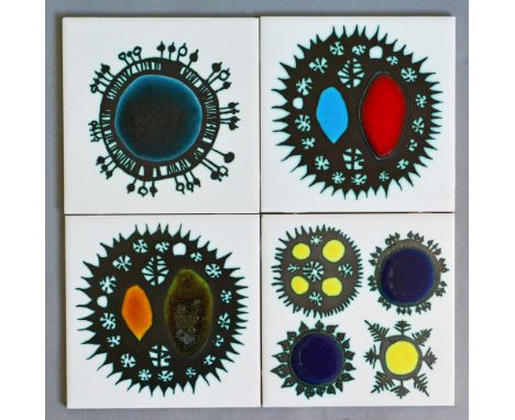Ann Wynn Reeves and Kenneth Clark - Four 6in dust pressed tiles each decorated with a variation of a snowflake with copper re