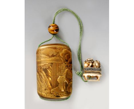 A late 19th Century four cased inro decorated on a nashiji gold ground in hiramakie and kirigane with a waterfall cascading f