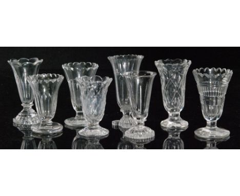 A collection of 18th Century and later jelly glasses to to include flat cut, slice cut and plain examples with assorted circu