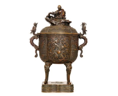A late 19th to early 20th Century Japanese bronze censer and cover of ovoid form, surmounted with a seated figure and a drago