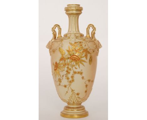 A late 19th Century Royal Worcester shape 1399 vase, the blush ivory ground decorated with raised gilt and enamel passion flo