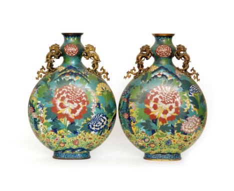 A pair of 19th Century cloisonné vases of archaic hu form each decorated with a central chrysanthemum flower head in tonal re