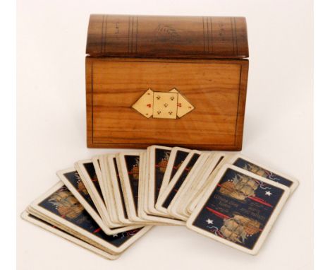An early 20th Century olive wood box form card case together with a set of fifty two White Star Line playing cards (53)