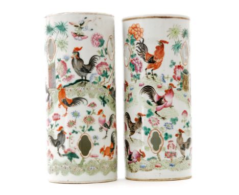 A pair of early 20th Century Chinese famille rose cylinder vases each enamel decorated with cockerel amidst chrysanthemum, fl