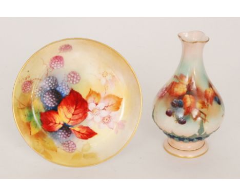 A 1930s Royal Worcester pin dish decorated by Kitty Blake with hand painted autumnal fruit and foliage against a pale yellow 