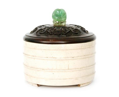 A Chinese Ming Dynasty 16th to 17th Century Ge type censer of cylindrical form raised to three feet below fine banded detail,