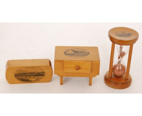 Three pieces of 19th Century Mauchline Ware comprising a trinket box formed as a table with opening draw decorated with a sce