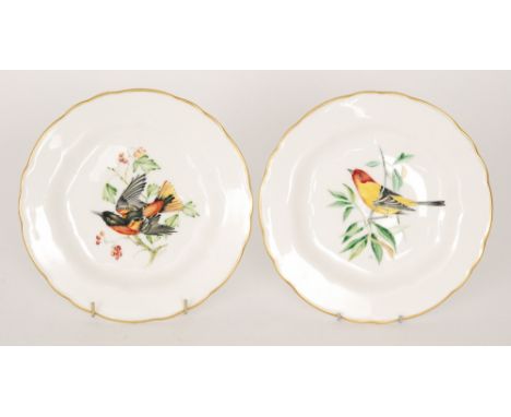 Two 1950s Royal Worcester cabinet plates each decorated with a hand painted bird, the first by Roberts and the second by Badh
