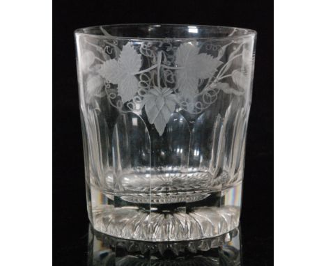 A Regency glass tumbler circa 1810, engraved with hops and barley surrounding a monogram above basal slice cutting and a lemo