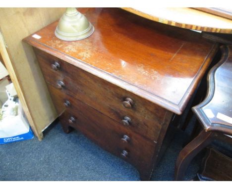 A 19th century mahogany commode formed as small drawer chest with lift top