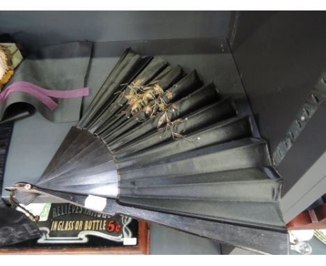 A vintage silk and embroidered fan