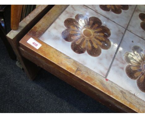 A 1970's tile top coffee table