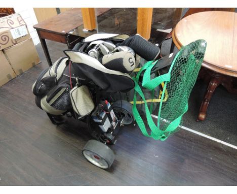 A motorised golf trolley and selection of clubs, a hoselock waterpump, safety visor, wallpaper stripper and decorators tools 