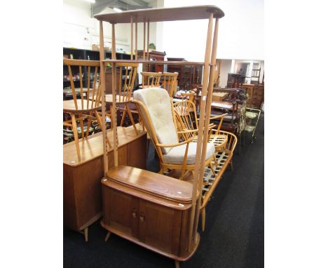 A 1960's design light elm Ercol modular bookshelf