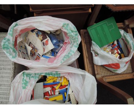 Three bags of vintage lego pieces etc