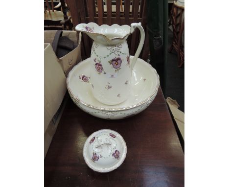 A Victorian ceramic wash bowl and ewer with matching soap dish