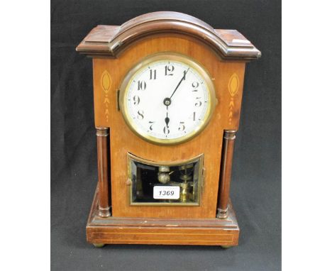 An Edwardian mahogany inlaid mantel clock, glass door