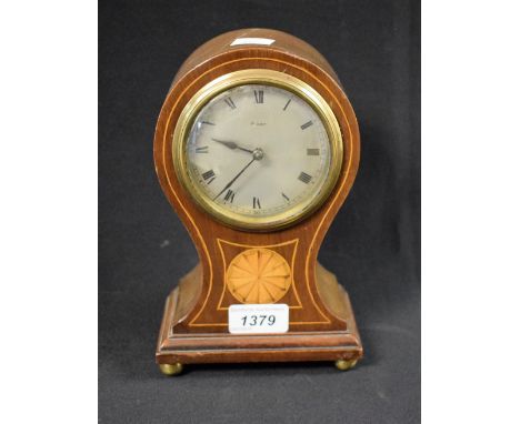 An Edwardian inlaid balloon shape mantel clock, eight day movement