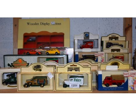 Die-cast Vehicles - Lledo Day's Gone, boxed sets, promotionals, etc; a wooden display cabinet; a model of the Flying Scotsman