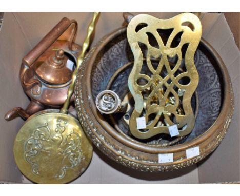 A Victorian copper kettle; a brass trivet; an embossed Persian style jardiniere; a brass toasting fork; qty