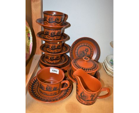 A Royal Worcester Crown Ware part tea set, designed by Robert "Scottie" Wilson, comprising four teacups, six saucers, six tea