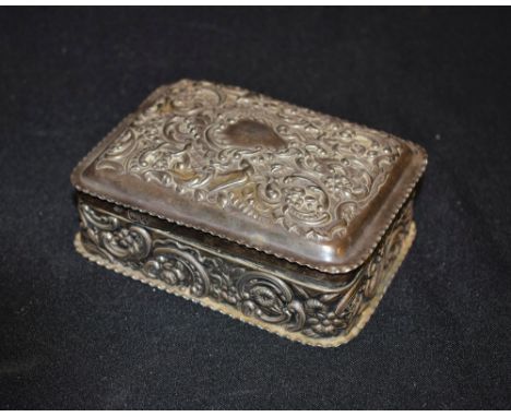 A silver trinket box, repousse birds and swags,London hallmarks William Comyns 1893, 11cm x 8.5cm approx 