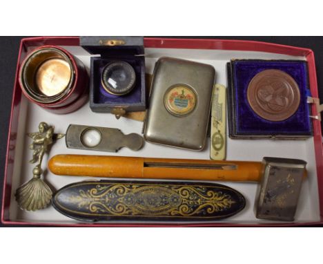 A Mauchline ware needle case; a spectacle case; travelling cup; vesta; cigarette case; bronze medallion; lens; etc