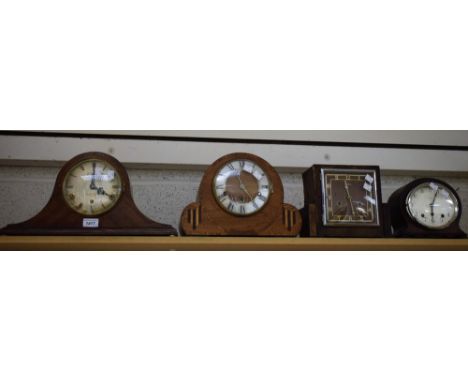 An oak cased Napoleon hat mantel clock, by U Fiechter, Huddersfield, Westminster chime, three winding holes, 45cm wide; other