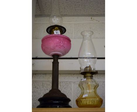 A Victorian Duplex twin burner oil lamp with pink opalescent glass font; another late 20th century (2)
