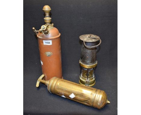 A Davis Kirkby miner's safety lamp; an Enots copper garden sprayer; a brass Pyrene fire extinguisher (3)