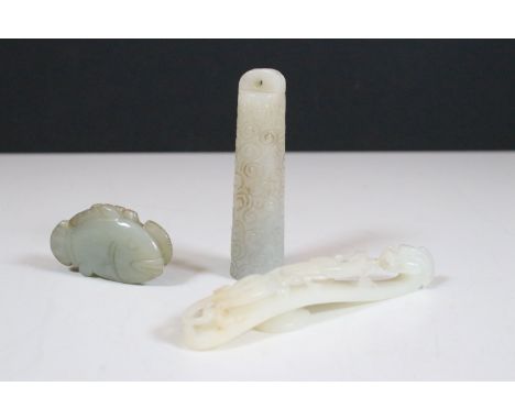 Collection of Chinese jade, comprising: a carved white jade Dragon belt hook, 10cm long, a pendent carved with scroll designs