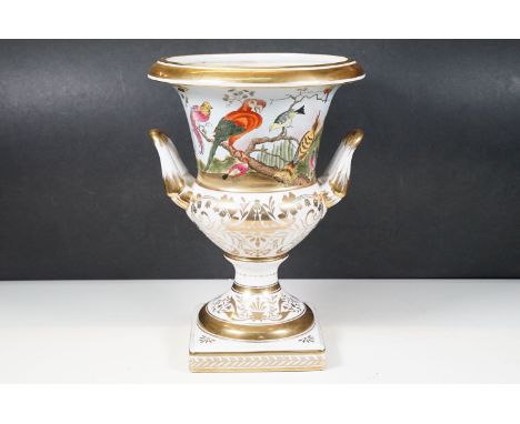 French Sevres style footed urn vase planter with exotic bird, flora and gilt accent detail design, raised on square plinth wi