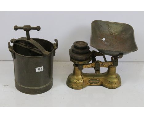 20th century vintage set of weighing scales and weights together with a tongue press (2) 