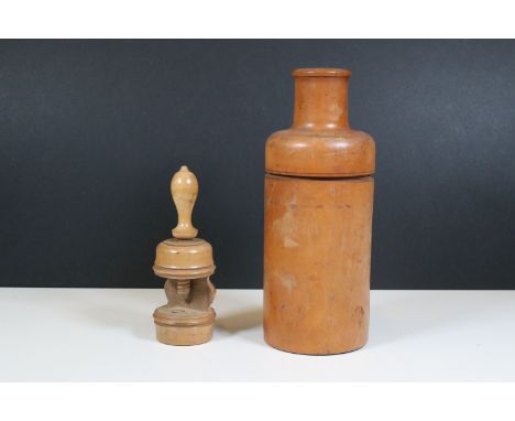 19th century sycamore bottle holder with screw lid, 27cm high together with 19th century boxwood nut sewing clamp, 17.5cm lon