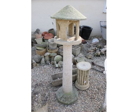 Reconstituted stone bird house on tapered column H 148cm together with a rectangular planter and small column plinth, H 52cm 