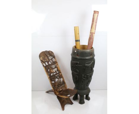 Collection of tribal treen items to include carved African birthing / fertility chair, African tribal carved ceremonial drum 