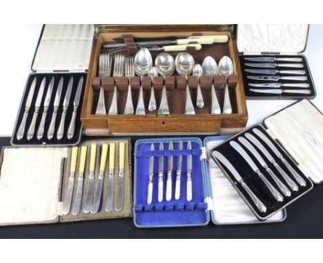 A canteen of silver plated cutlery together with five cased sets of cutlery to include hallmarked silver handled knives. 