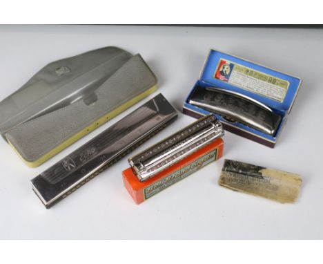 Group of three Hohner harmonicas to include boxed Hohner Bell Brand Organ, cased Hohner Echo and The Hohner Band Harmonica