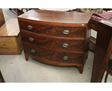 19th century mahogany bow front chest of three drawers, H 83cm, W 103cm, D 43cm